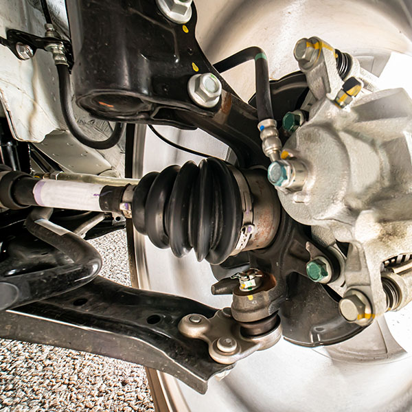 CV axle and suspension system components in front wheel